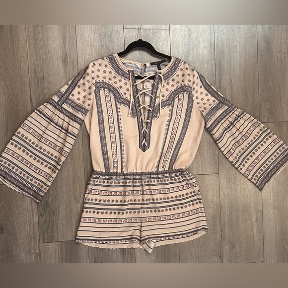 BCBG MaxAzria ROMPER bell sleeves button up back with tie front. - Picture 3 of 7